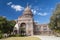 Texas State Capitol with Heroes of the Alamo Monument in Austin, TX