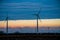 Texas Wind Energy Turbine Farm at Twilight Dusk