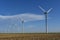 Texas Windmills against Blue Sky with White Clouds