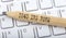 Text 1040 IPS FORM on wooden pencil on white keyboard. Business concept