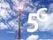 Text 5G and GSM repeater tower in front of blue cloudy sky