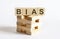 Text BIAS on a wooden cube blocks on white background