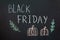 Text Black Friday written on black chalkboard and pictogram of pumpkin