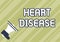 Text caption presenting Heart Disease. Word Written on A type of disease that affects the heart or blood vessels