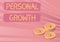 Text caption presenting Personal Growth. Concept meaning improve develop your skills qualities Learn new materials Coins