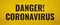Text danger coronavirus on yellow background. Banner