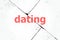 Text Dating. Social and education concept . Closeup of rough textured grunge background