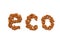 Text Eco made by Almonds nuts on a white background. Pile of selected almonds close up. Organic food