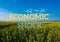 Text ECONOMIC SHOCK against defocused agriculture field message. Global hunger, food crisis, inflation, high prices