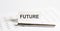 Text FUTURE on stickers,pen on the background of documents. Financial bookkeeping, Accounting Concept