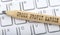 Text GROSS PROFIT MARGIN on wooden pencil on white keyboard. Business concept