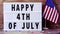 Text happy 4th of july in a lightbox