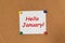 Text Hello January! written on a sticker