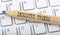 Text INDUSTRY TRENDS on wooden pencil on white keyboard. Business concept