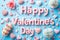 Text In Large Letters Happy Valentines Day On Sweet Treats Fiesta Background