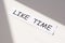 Text LIKE TIME on white paper on a white background.Social media concept