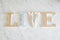 Text LIVE made with wooden letters, vintage retro style