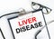 Text Liver Disease in the folder with the stethoscope and glasses