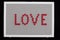 Text love on child mosaic