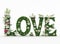 Text LOVE word spelled out with a charming arrangement of leaves and flowers