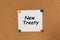 Text New Treaty written on a sticker