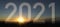 Text with the number of the year 2021 with a background image of the rising sun.