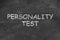 Text Personality Test written on black chalkboard