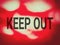 Text says KEEP OUT on red abstract background