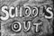 Text School`s Out written on chalkboard. Summer holidays