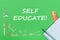 Text self educate, school supplies wooden miniatures, notebook with ruler, pen on green backboard