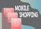 Text showing inspiration Mobile Shopping. Concept meaning Buying and selling of goods and services through mobile File