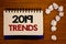Text sign showing 2019 Trends. Conceptual photos New year developments in fashion Changes Innovations ModernIdeas on notebook wood