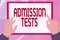 Text sign showing Admission Tests. Word Written on an exam that you take to be accepted into a school Hands Illustration