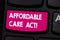 Text sign showing Affordable Care Act. Conceptual photo Guarantees that can receive or buy health insurance Keyboard key