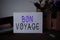 Text sign showing Bon Voyage. Conceptual photo used express good wishes to someone about set off on journey Flowers and