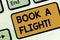Text sign showing Book A Flight. Conceptual photo Purchase tickets to make a trip by plane Planning vacations Keyboard