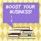 Text sign showing Boost Your Business. Conceptual photo improving some measure of enterprises success Growth Uneven Pile