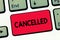 Text sign showing Cancelled. Conceptual photo decide or announce that planned event will not take place Keyboard key