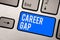 Text sign showing Career Gap. Conceptual photo A scene where in you stop working by your profession for a while Keyboard blue key