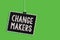 Text sign showing Change Makers. Conceptual photo Young Turk Influencers Acitivists Urbanization Fashion Gen X Hanging blackboard