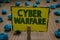 Text sign showing Cyber Warfare. Conceptual photo Virtual War Hackers System Attacks Digital Thief Stalker Clothespin holding yell