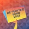 Text sign showing De Clutter Your Life. Conceptual photo remove mess clutter from place organize and prioritize Hand