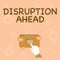 Text sign showing Disruption Ahead. Word Written on Transformation that is caused by emerging technology Hand Showing