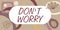 Text sign showing Do Not Dont Worry. Word Written on indicates to be less nervous and have no fear about something