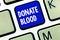 Text sign showing Donate Blood. Conceptual photo Refers to the collection of blood commonly from donors
