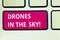Text sign showing Drones In The Sky. Conceptual photo Aerial helicopter modern device taking pictures and video Keyboard