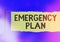 Text sign showing Emergency Plan. Conceptual photo instructions that outlines what workers should do in danger Rolled