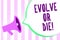 Text sign showing Evolve Or Die. Conceptual photo Necessity of change grow adapt to continue living Survival Megaphone loudspeaker