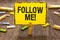 Text sign showing Follow Me. Conceptual photo Inviting a person or group to obey your prefered leadership Clothespin holding yello