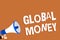 Text sign showing Global Money. Conceptual photo International finance World currency Transacted globally Man holding megaphone lo